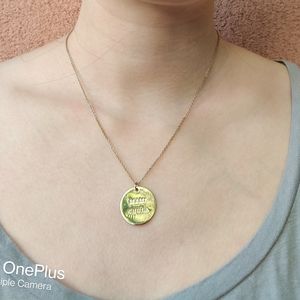 15″–18″ gold tone coin shaped "Mami Chula" pendant necklace